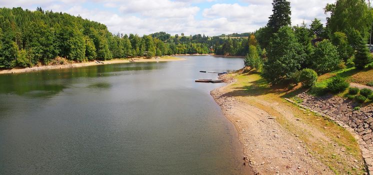 View over the Pastviny dam in the Czech Republic. Pastviny dam has hydroelectric power station.