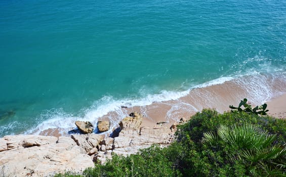 Top view of the beach, cliff and sea. 