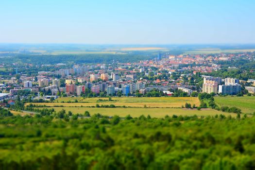 Tilt shift landscape panorama of the Kutna Hora city and forest in the Czech Republic.