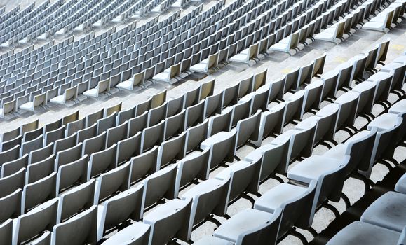 The lines of the seats on the stadium.