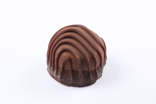 isolated image of fine chocolates in white, dark, and milk chocolate