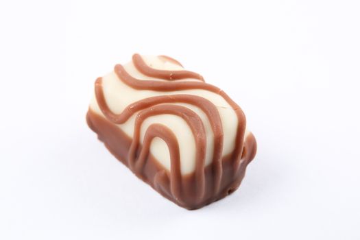 isolated image of fine chocolates in white, dark, and milk chocolate