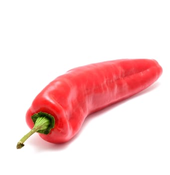 Closeup of red pepper on white background.