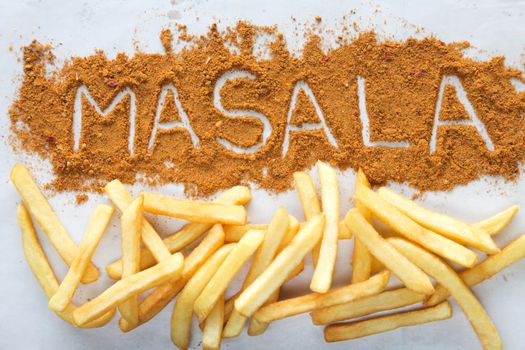 Masala written text with Potato chips french fries