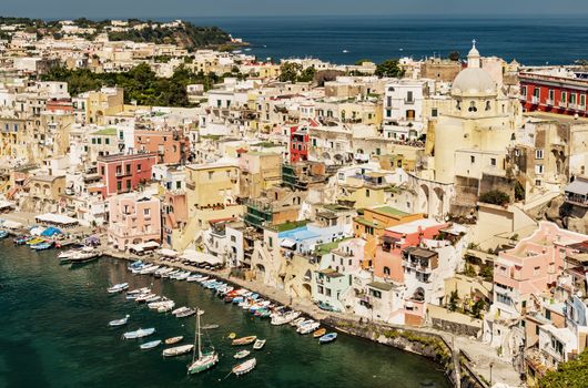 view of the harbour and the colored buildings in Procida, Naples