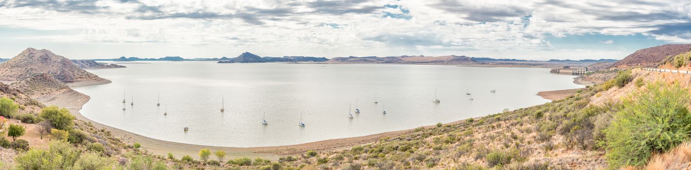 Sail yachts in the Gariep Dam on the border between the Free State and Northern Cape provinces. It is the largest dam in South Africa. The dam is half full