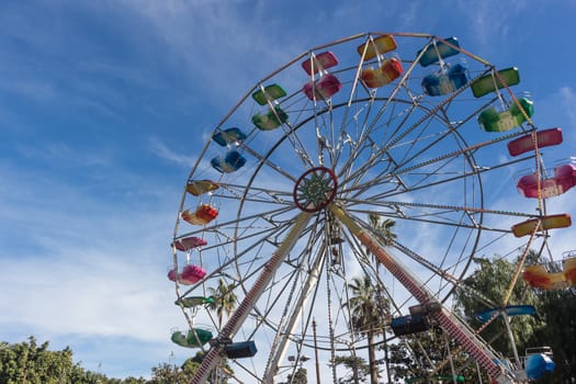 A colourful ferris wheel. Front view