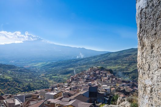 View of volcano Etna from a small Sicilian village