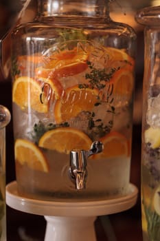 Citrus lemon, lime and orange slices mixed with water for a refreshing summer drink.