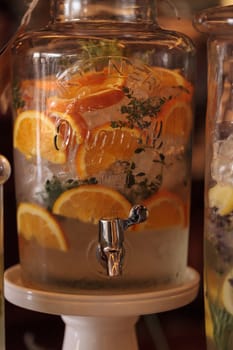 Citrus lemon, lime and orange slices mixed with water for a refreshing summer drink.