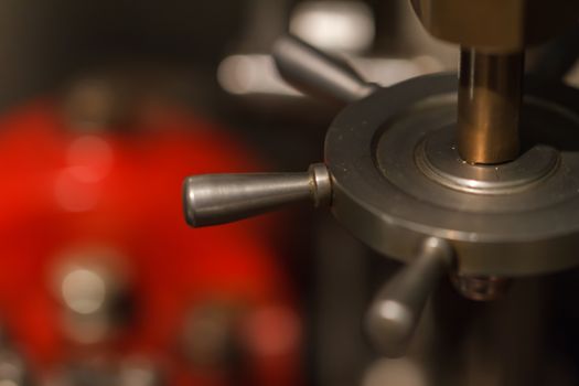 Close up detailed view of historical old wooden and metal machines.