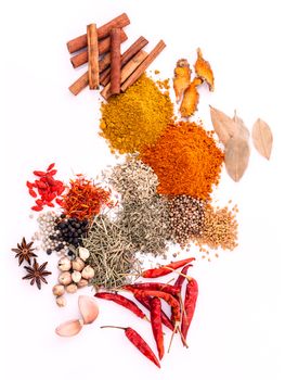 Assorted of spices black pepper ,white pepper,fenugreek,cumin ,bay leaf ,cinnamon,thyme,matrimony vine(chinese wolfberry),safflower,rosemary and fennel seeds isolated on white background.