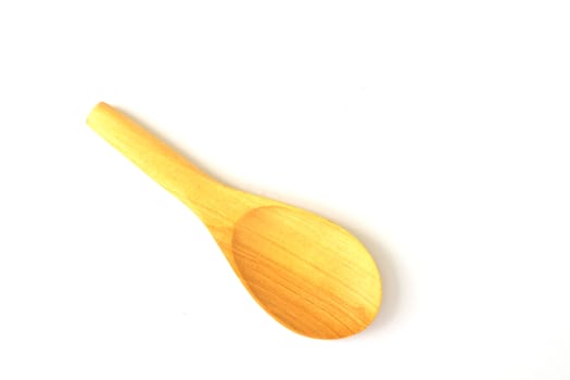 close up of wooden spoon on white background with clipping path 
