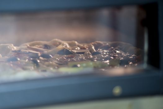 Pizza baking in the oven. High resolution