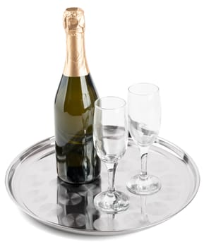 Champagne bottle and two champagne glasses on tray isolated on white background. Top view