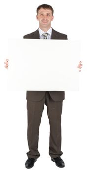 Businessman behind blank paper isolated on white background