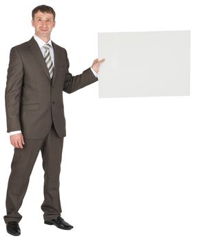 Handsome business man presenting your product on white board