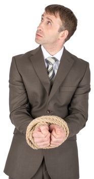 Businessman with bound hands isolated on white background