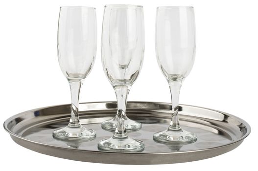 Many champagne glasses on tray isolated on white background