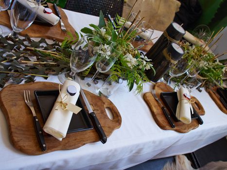 Beautiful festive creative colorful table setting in a restaurant hotel