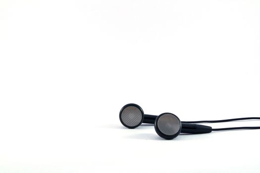 Black headphones with wires on white background 