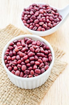 Azuki beans or red beans in white cup.