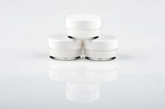 Blank white facial cream jar isolate on white background
