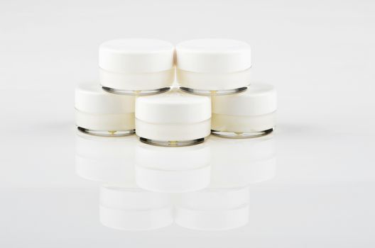 Blank white facial cream jar isolate on white background