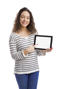 Beautiful and happy woman showing something on a tablet