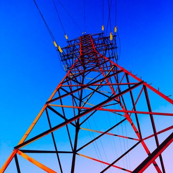 High voltage post. High-voltage tower sky background.