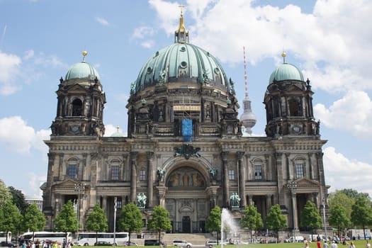 BERLIN, GERMANY - MAY 12, 2016: Cathedral with television tower, sights of Berlin on May 12, 2016 in Germany, Europe