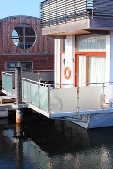 Houseboat with orange lifesaver at the porch