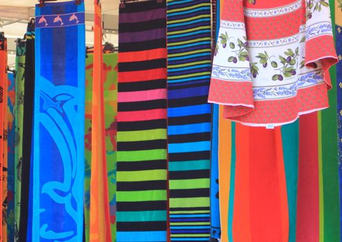 Towel shop at summer market in Italy