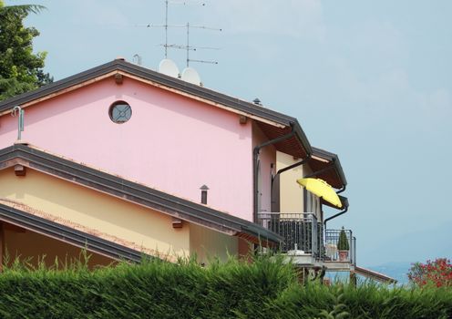 Colorful house fronts with mountains in the background