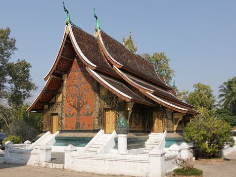 LUANG PRABANG, LAOS - FEBRUARY 12, 2016:  Wat Xieng Thong, one of the temples in Luang Prabang on February 12, 2016 in Laos, Asia