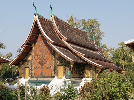 LUANG PRABANG, LAOS - FEBRUARY 12, 2016:  Wat Xieng Thong, one of the temples in Luang Prabang on February 12, 2016 in Laos, Asia