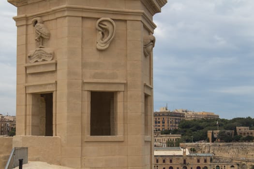 Park in a part of fortification of the city Senglea at the mediterranean island Malta. Tower with a view on the maltese capital Valletta.