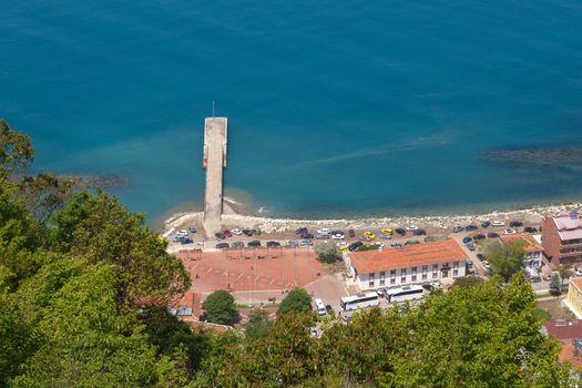 General top view of Ayancik town in Sinop in Black Sea region inside green trees with blue sea.