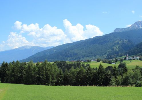 Typical view over the Alps with small village