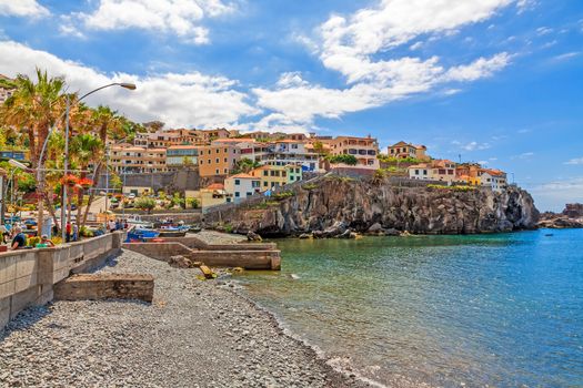 Camara de Lobos, Madeira - June 8, 2013: Town Camara de Lobos, Madeira with fishing boats. The picturesque fishermens village is famous for its former guest Winston Churchill.