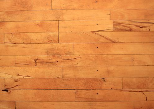 Old floor of flammed beechwood with nails