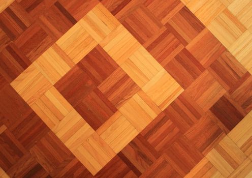 Teakwood floor of quadratic sticks forming two quadrants