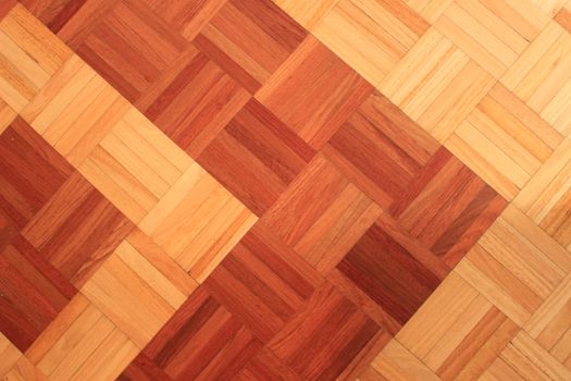 Teak floor of quadratic sticks forming an arrow