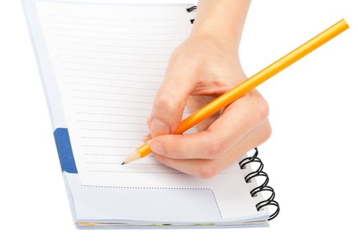 Closeup of woman's hand writing on paper on isolated white background