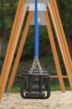 Playground with empty swings for kindergarten children