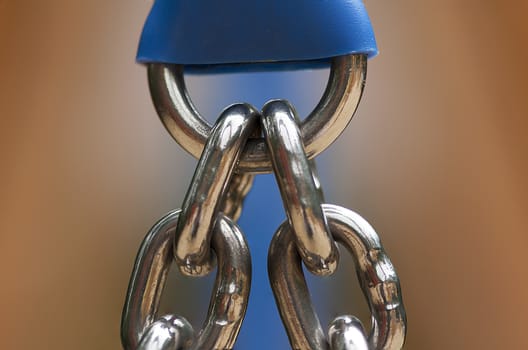 Metal chain joint from a child's swing in a park