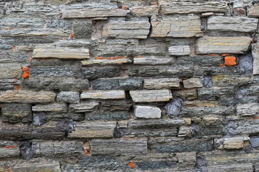 Old style rough stone rock wall texture