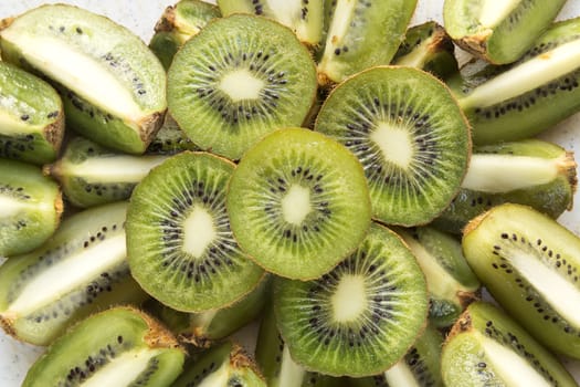 Fresh organic Kiwi Fruit Slices arranged showing the pips & structure