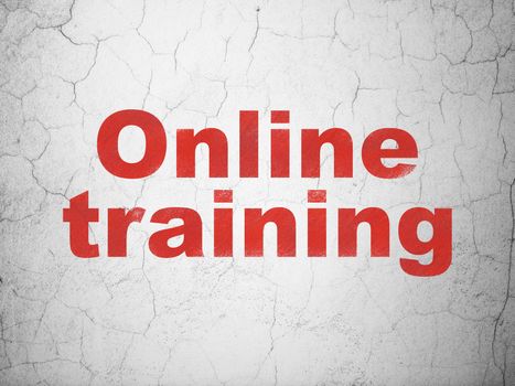 Studying concept: Red Online Training on textured concrete wall background