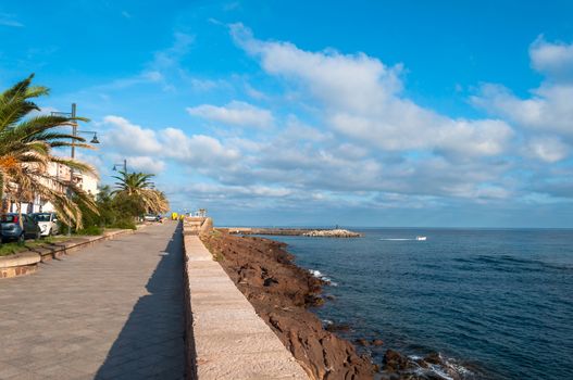 beach near the city of castelsardo in a sunny day